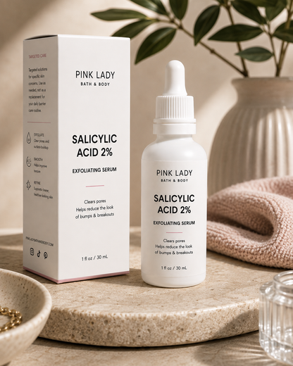 Pink Lady Salicylic Acid 2% Exfoliating Serum with retail box packaging on a neutral stone display.